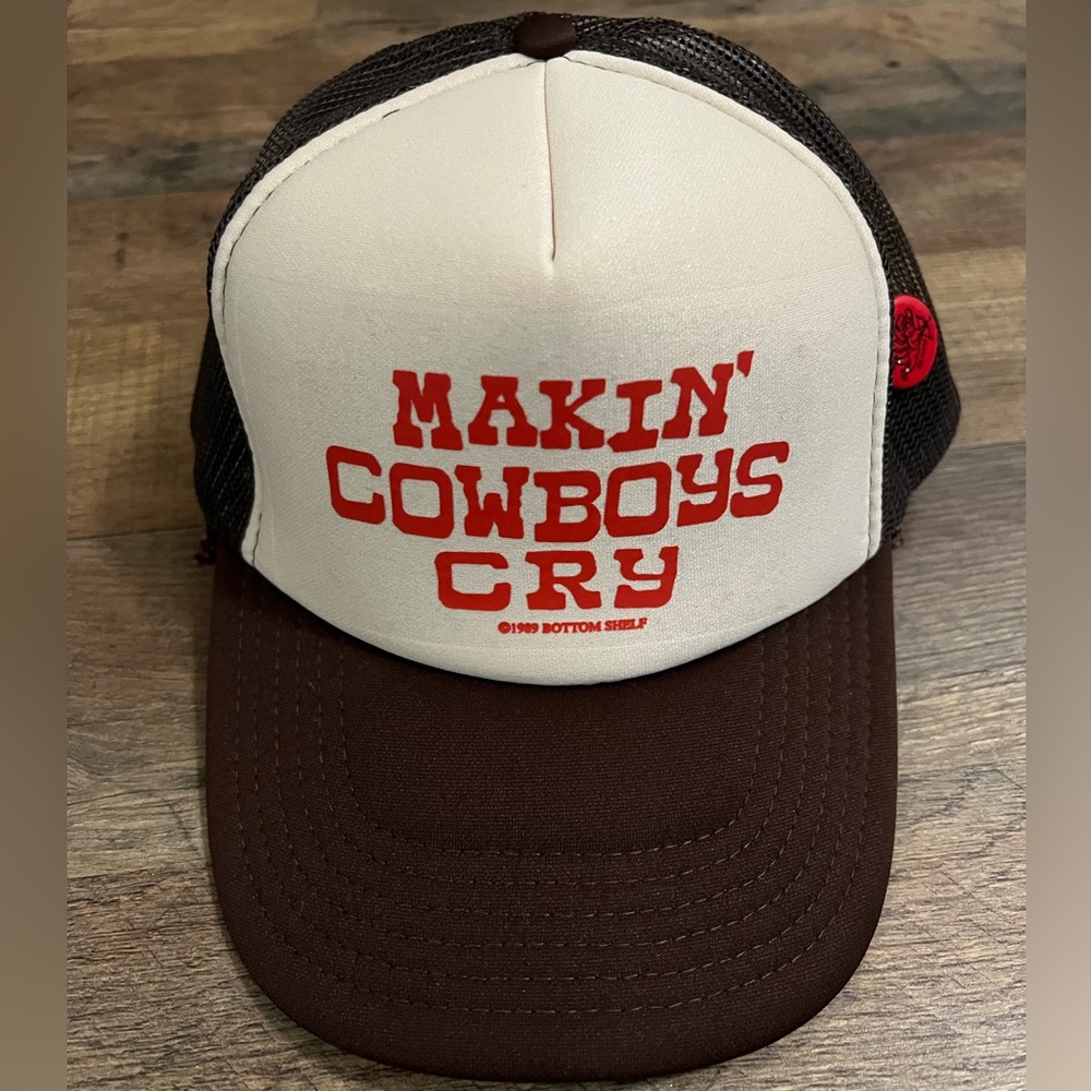 Makin’ cowboys cry trucker hat